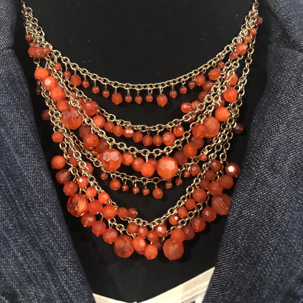 Multi-strand coral/orange statement necklace